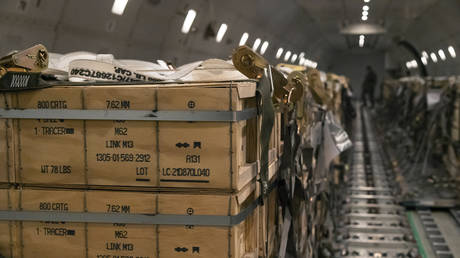 FILE PHOTO: Pallets of ammunition, weapons and other equipment bound for Ukraine at Dover Air Force Base, January 30, 2022.