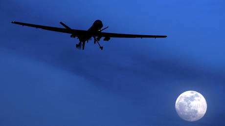FILE PHOTO: An unmanned US Predator drone flies over Kandahar Air Field, southern Afghanistan