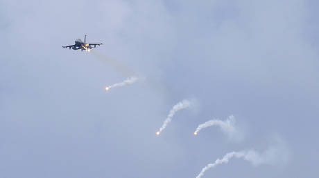 FILE PHOTO: A US-made F-16V fighter jet launches flares during military exercises in  Taiwan, July 16, 2020