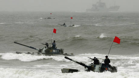 FILE PHOTO. Amphibious armored vehicles of the Chinese People's Liberation Army pictured during military drills.