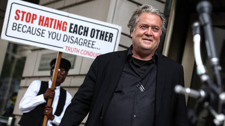 Former White House chief strategist Steve Bannon is shown speaking to reporters after the fourth day of his trial for contempt of Congress last July in Washington.