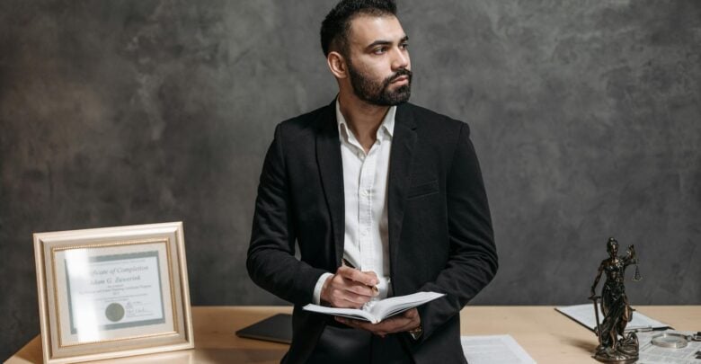 Photo by Pavel Danilyuk: https://www.pexels.com/photo/professional-male-lawyer-holding-a-notebook-8112138/