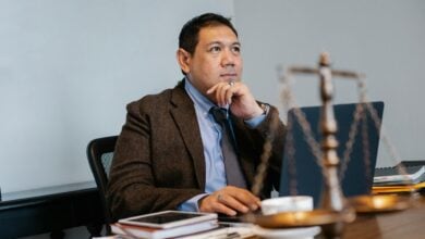 Photo by Sora Shimazaki: https://www.pexels.com/photo/asian-male-judge-working-on-laptop-in-office-5668773/