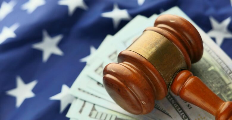 Photo by Towfiqu barbhuiya: https://www.pexels.com/photo/close-up-photo-of-wooden-judge-gavel-over-paper-bills-11505601/